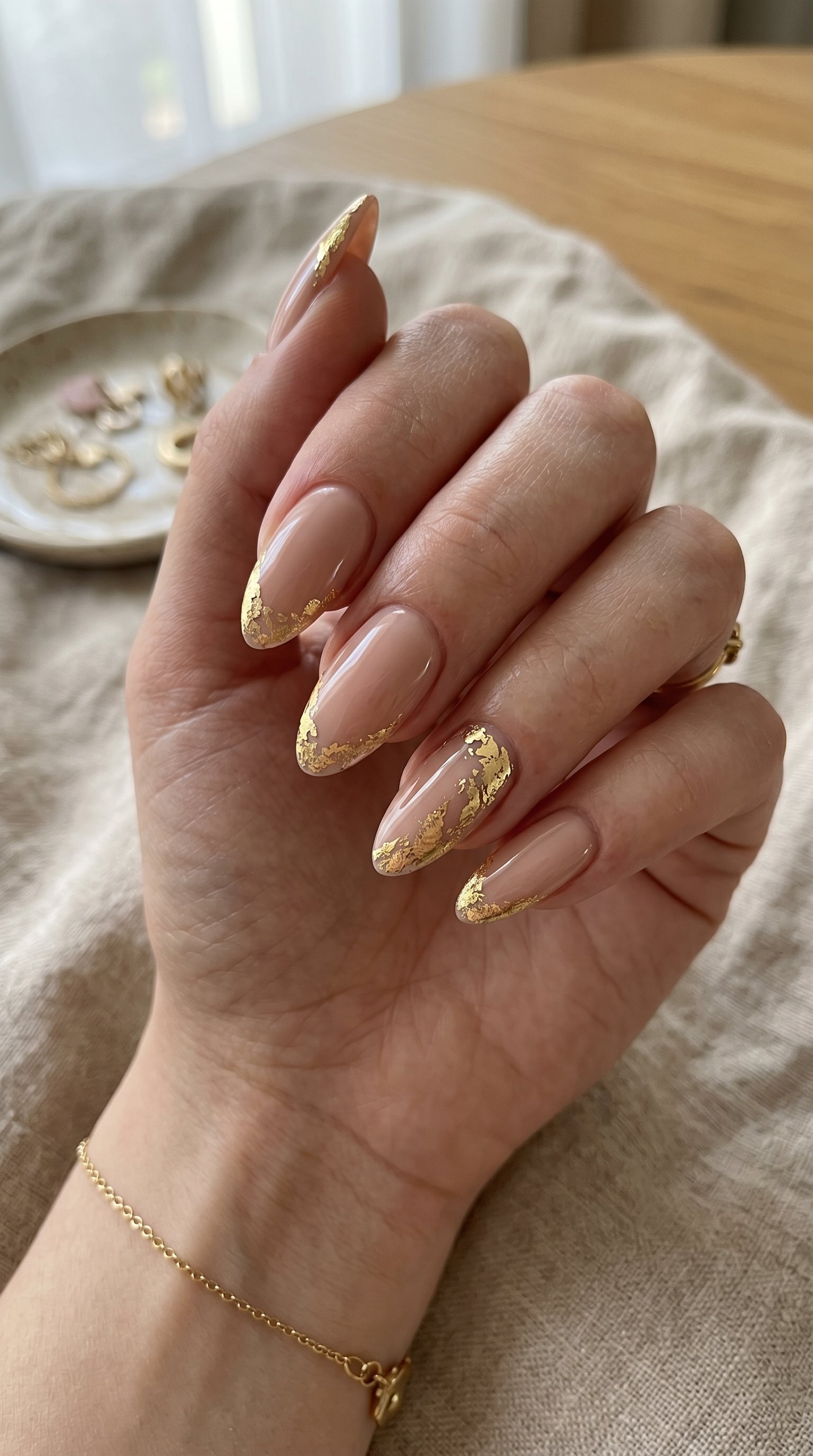 Nude nails with gold foil